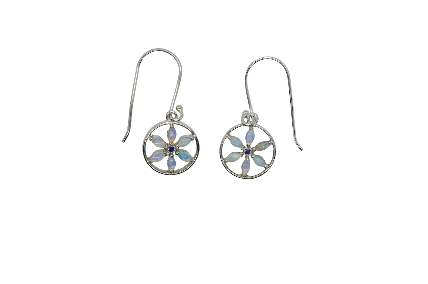 Silver earrings with floral designs on a white background