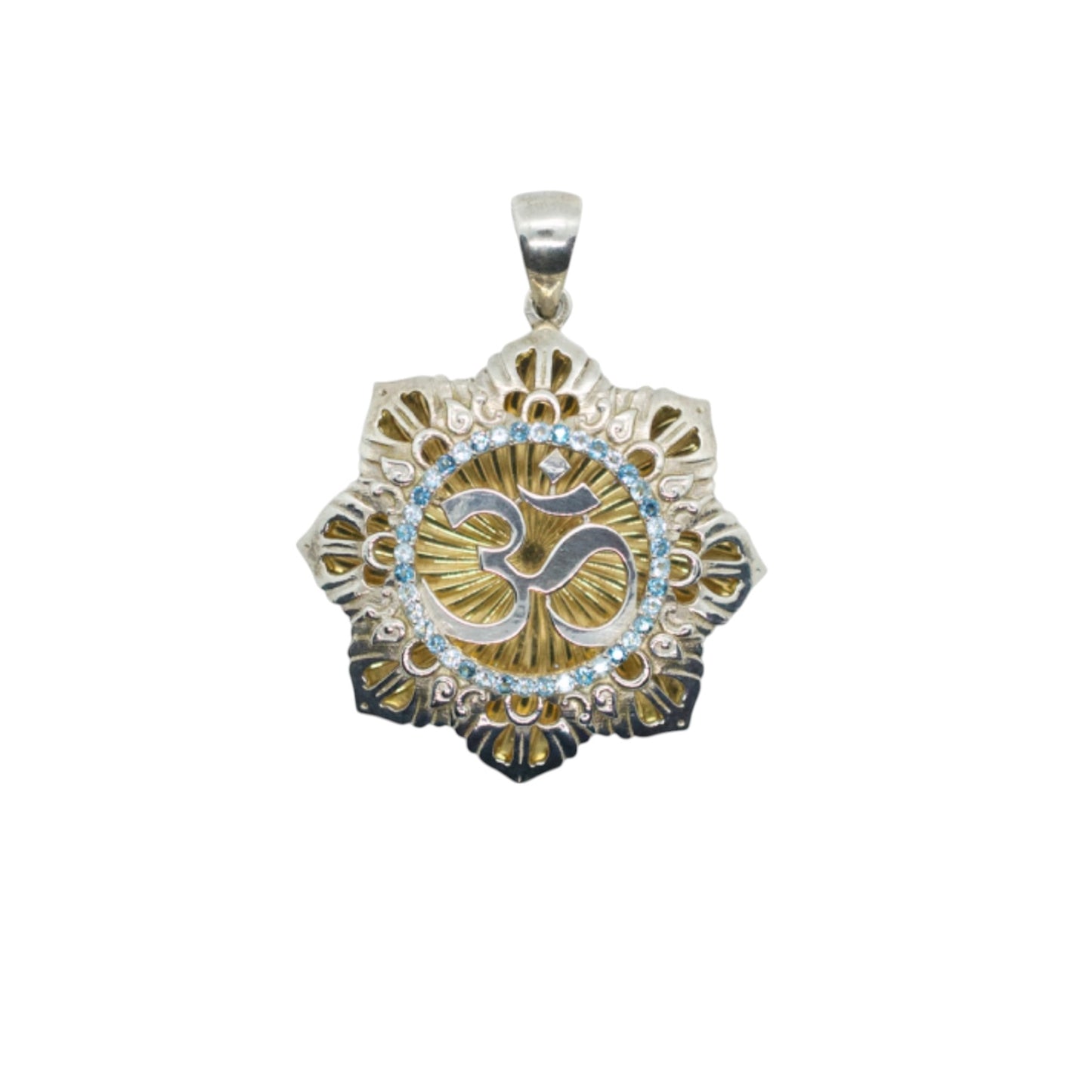 A silver and gold-plated pendant featuring blue sapphires and a design with the spiritual symbol 'Om' in the center.