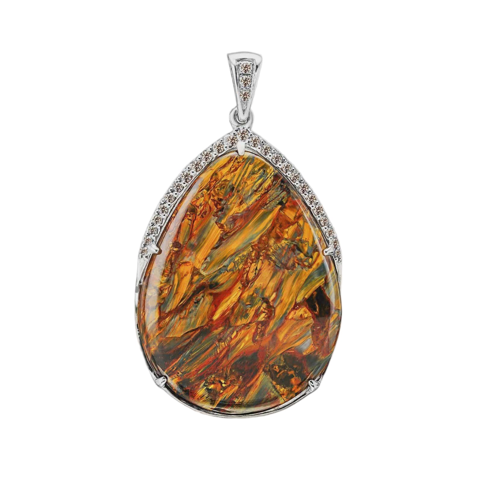 Teardrop-shaped amber pendant with silver frame on a white background