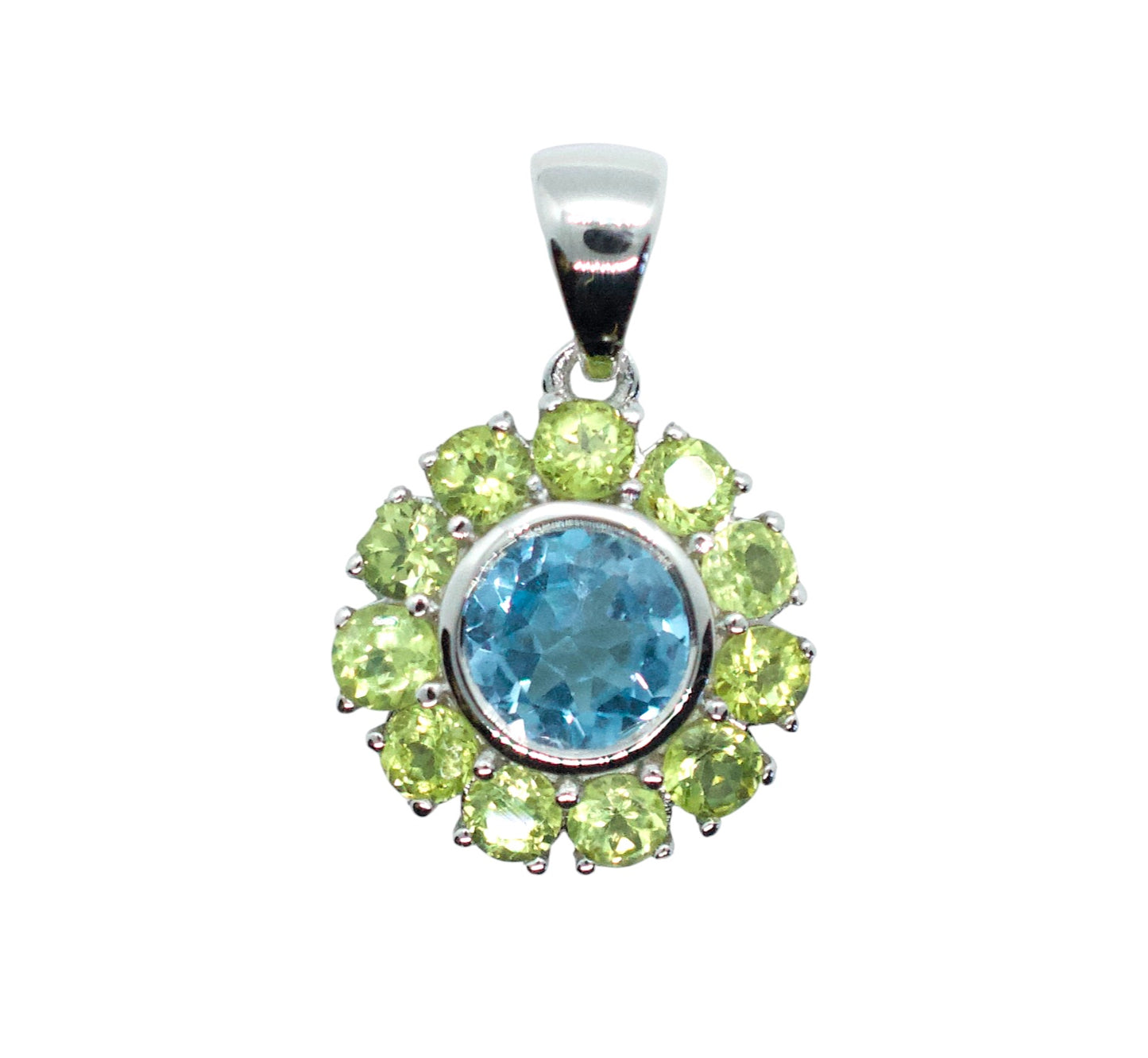 Jewelry pendant with blue gemstone and green stones on a white background