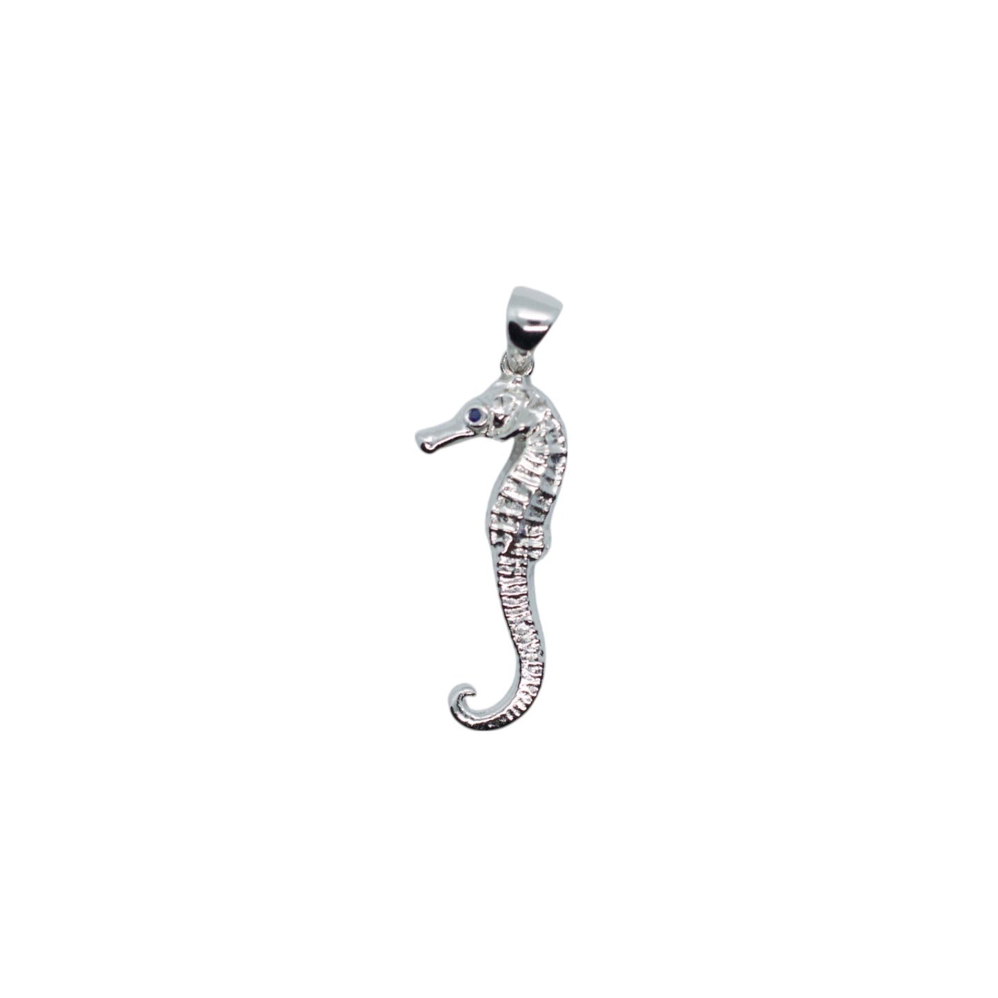 Silver seahorse pendant on a white background