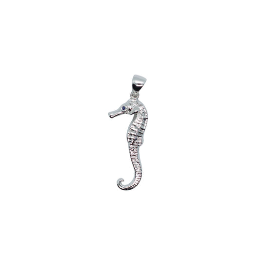 Silver seahorse pendant on a white background