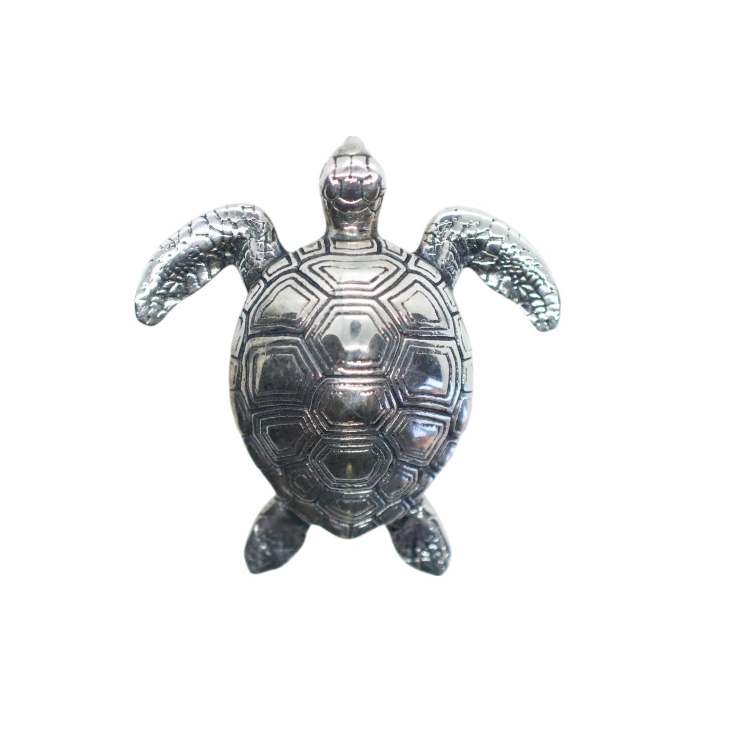 Silver turtle figurine on a white background