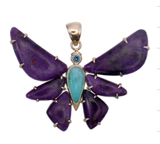 A purple sugilite butterfly necklace with blue opal and a blue diamond head, set in 18-karat gold.