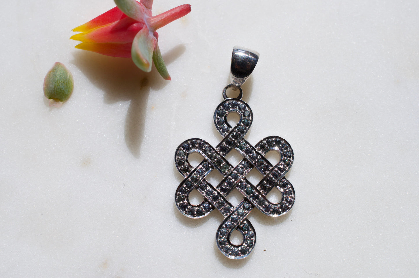 Blue Sapphire Srīvatsa Endless Knot Sterling Silver Pendant